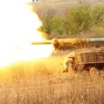 Ukrainian T-64 tank fitted with an anti-drone cope cage